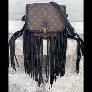 Louis Vuitton fringed by leather and vodka